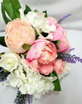 Pink peonies and rose bouquet